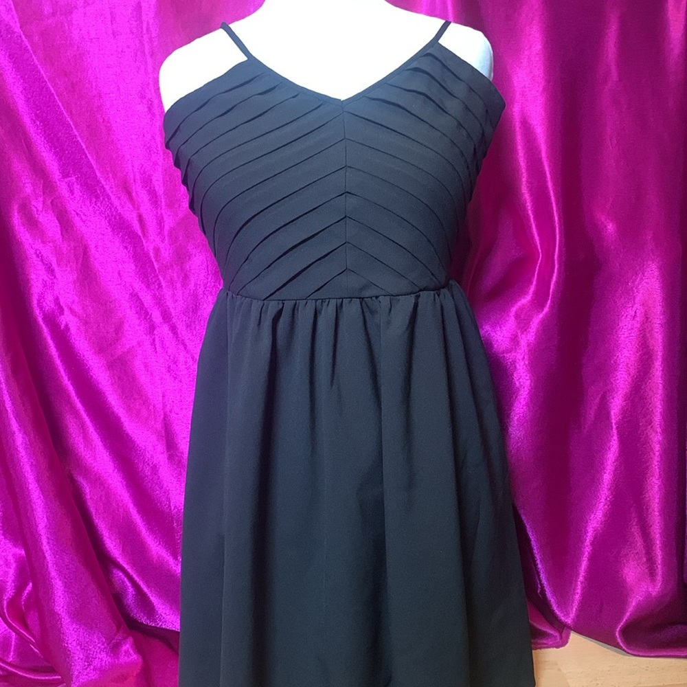 Ya Los Angeles size small black unique tie back dress. Like new